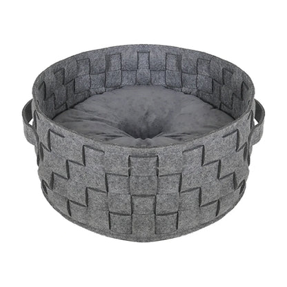 Rosewood Silver Felt and Fur Plaited Pet Bed with the smooth side of the reversible cushion facing up.