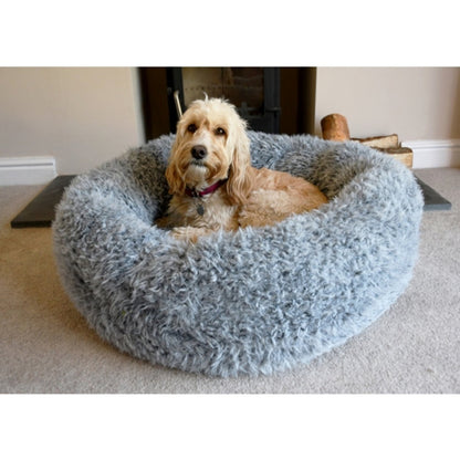 Golden dog resting in the Rosewood Silver Fluff Comfort Round Dog Bed, showing the fluffy silver-grey faux fur and supportive raised sides