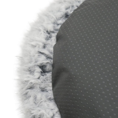 Close-up of the Rosewood Silver Fluff Comfort Round Dog and Cat Bed showing the dark grey non-slip dotted fabric underside next to the soft silver-grey faux fur edging.