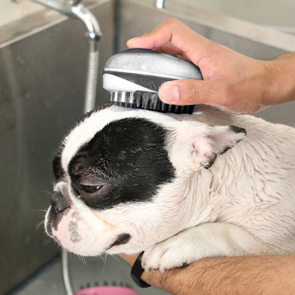 Rosewood 2 in 1 bath and groom brush used on a dog to help spread shampoo over the coat
