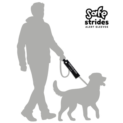 Safe Strides Service Dog black alert sleeve shown on a leash to demonstrate size and placement