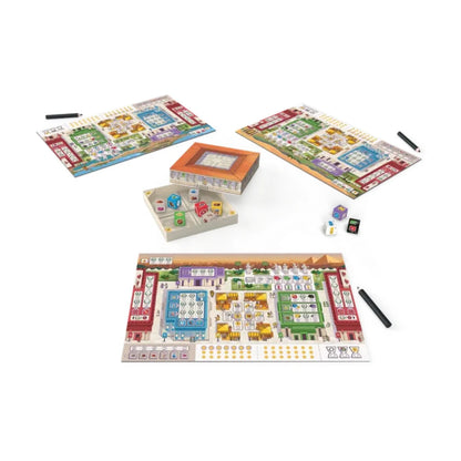 7 Wonders Dice game setup with player boards, pencils, Forum dice box and colourful dice for simultaneous city building gameplay