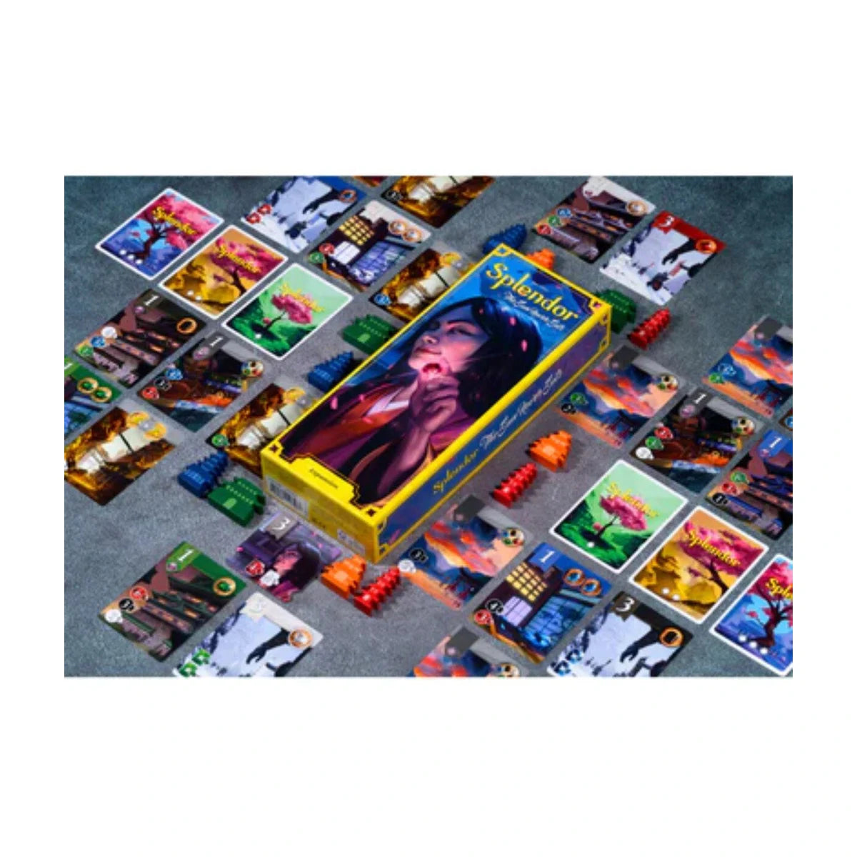 Splendor The Sun Never Sets Expansion components arranged with development cards, strongholds, and expansion box