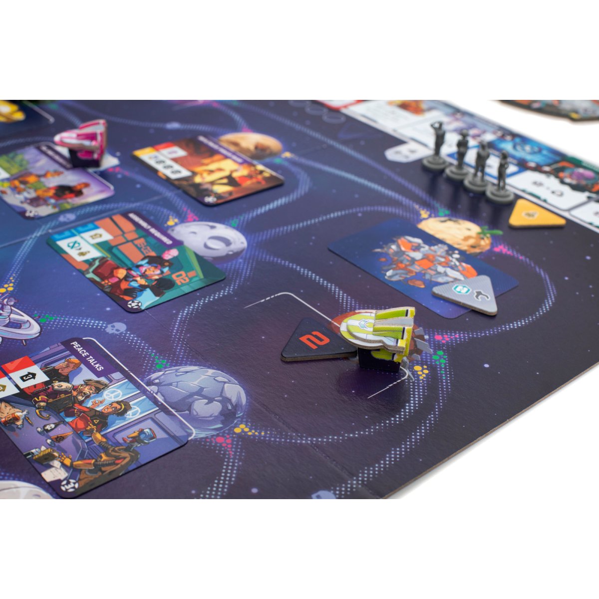 Starship Captains space board gameplay close-up with starship pieces, mission cards, planets and galaxy routes