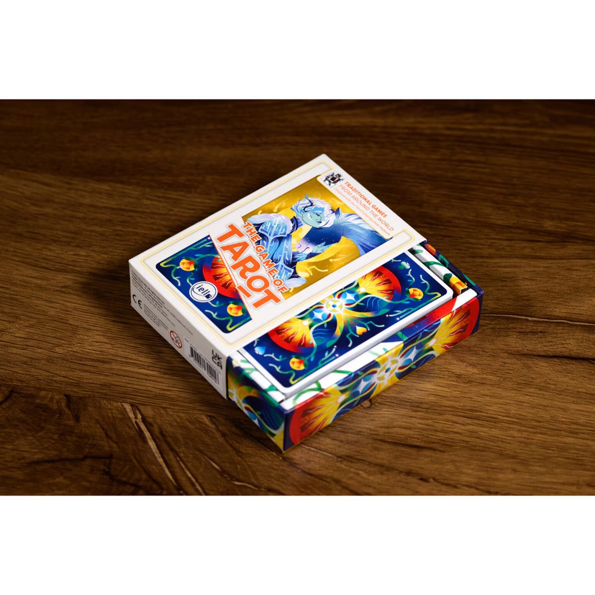 Open box of The Game of Tarot showing the card deck and illustrated card backs inside the tray