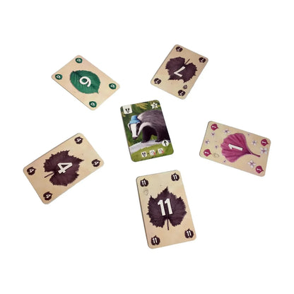 Tricky Badger Card Game trick example with a badger collection card and numbered coloured leaf cards