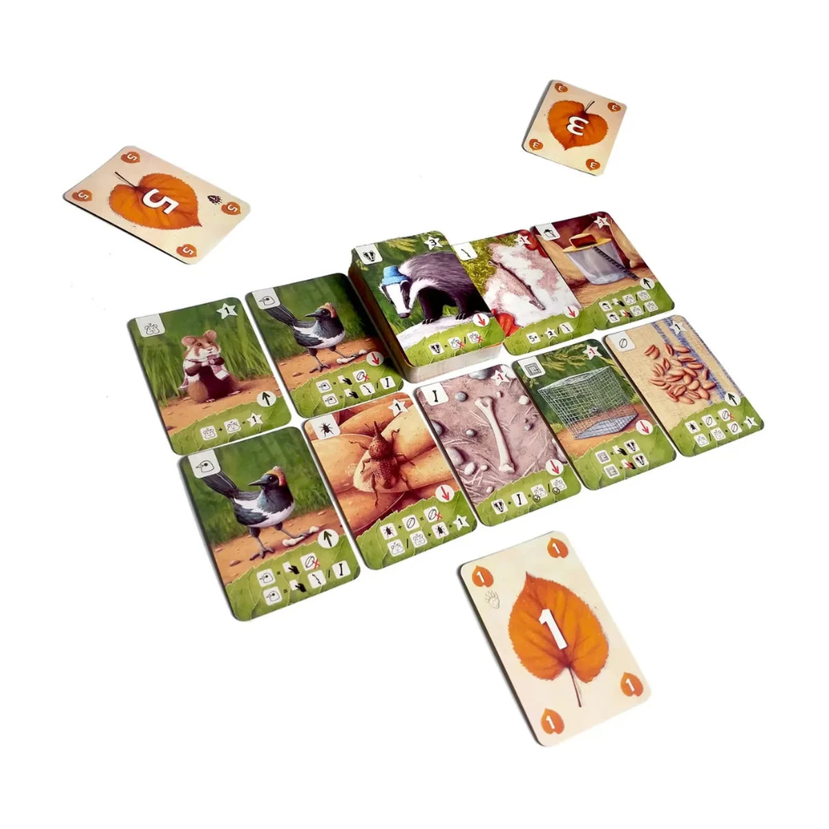 Tricky Badger Card Game play area showing animal and object collection cards with numbered leaf cards