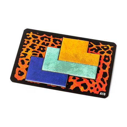Ubongo Travel Edition completed puzzle card with fitted interlocking pieces