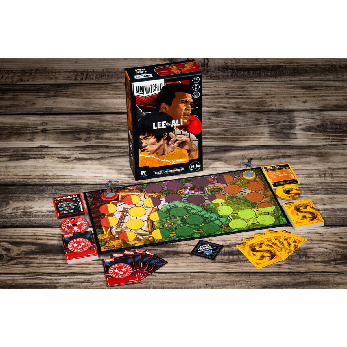 Unmatched Lee vs Ali game setup with board miniatures cards and health dials