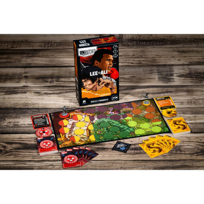 Unmatched Lee vs Ali game setup with board miniatures cards and health dials