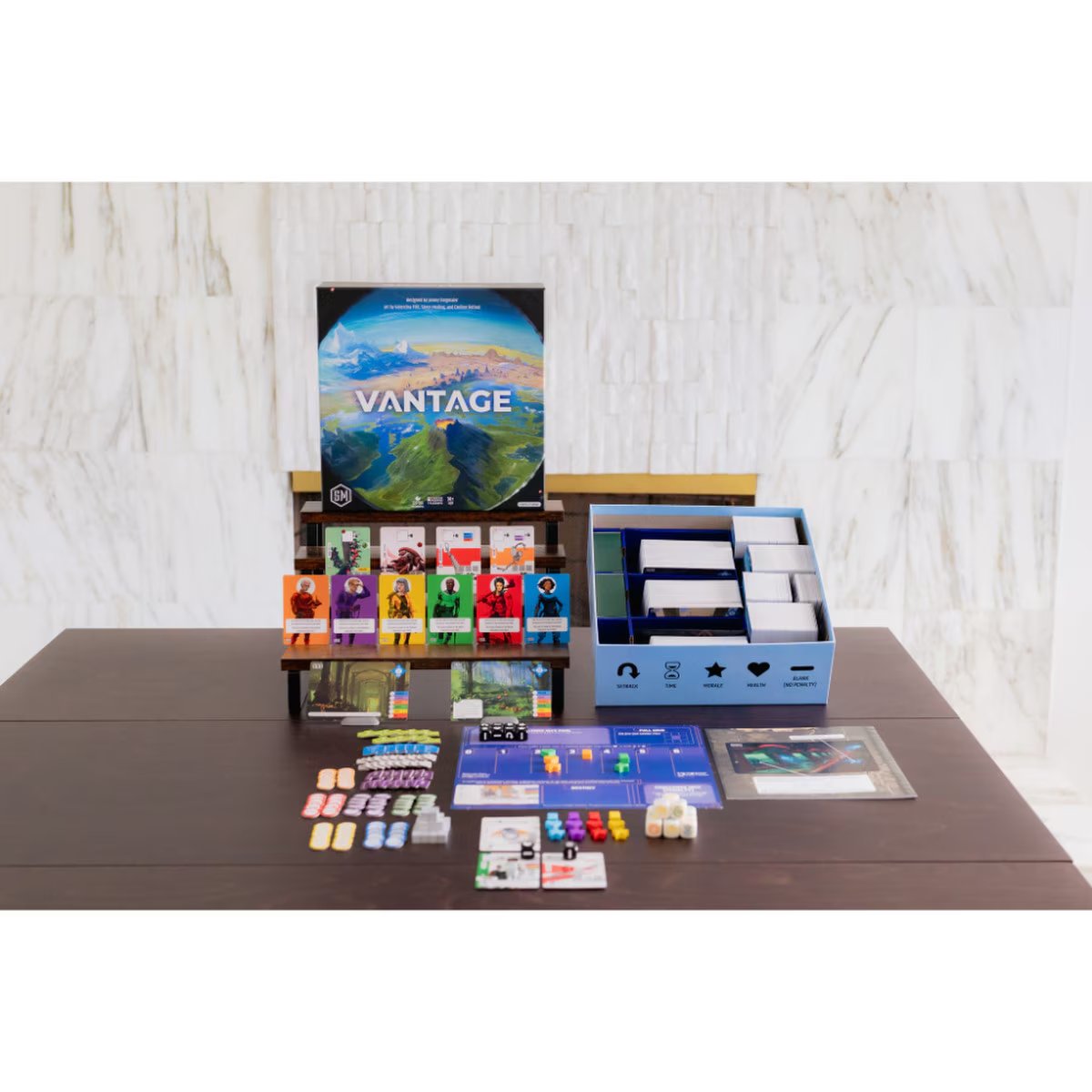 Vantage board game components with cards, dice, storybooks, trackers, tokens and player card holders